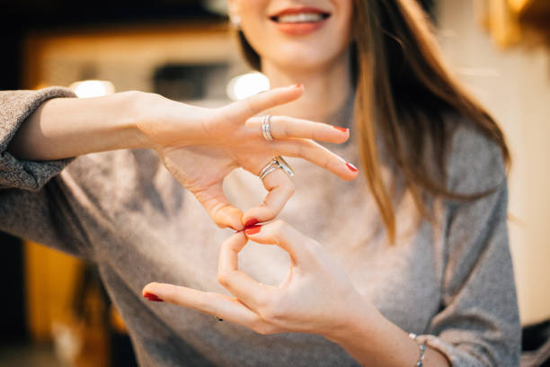 Woman using sign language Woman using sign language sign language stock pictures, royalty-free photos & images