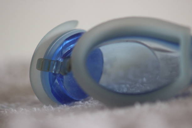istock Swimming googles glasses on towel 1127525611