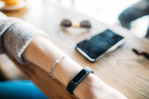 istock Woman wearing smart wristband 1127533701