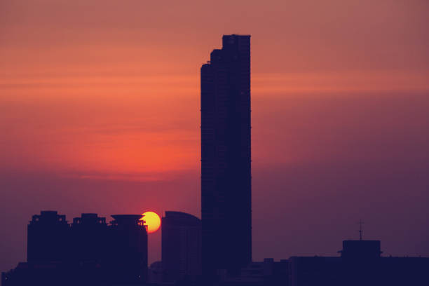 istock Sky with clouds over the evening city with sunset 1127534021