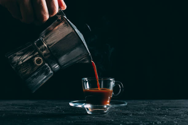 istock Mocha Pot and Espresso on Dark Background 1127534126