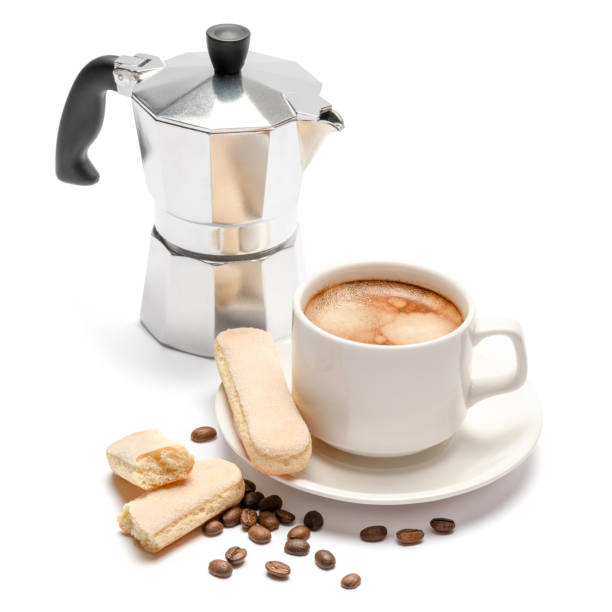 istock White ceramic cup of coffee with a savoiardi ladyfinger cookie on a plate 1127537517