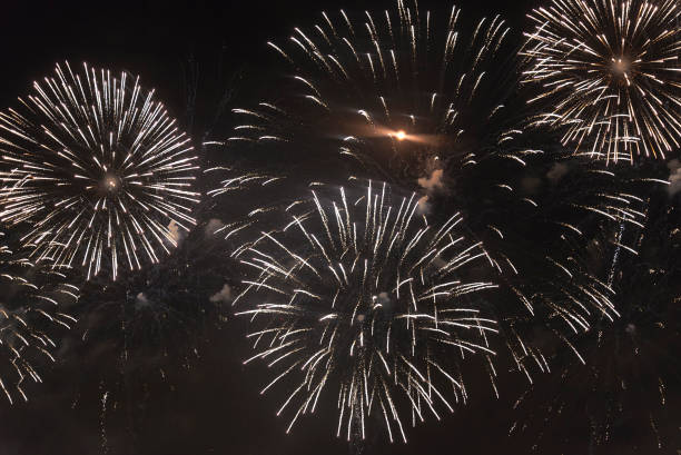 istock Fireworks in the night sky on a holiday. 1127538273