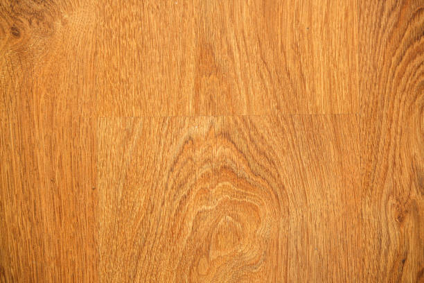 istock laminate or parquet floor - wood flooring material. Background 1127540272
