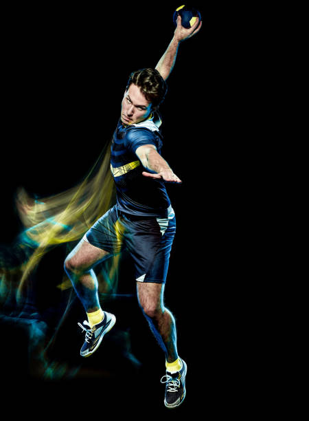 istock handball player young man isolated speed light painting 1127541772