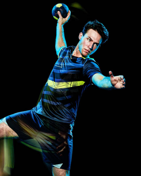 istock handball player young man isolated speed light painting 1127541857