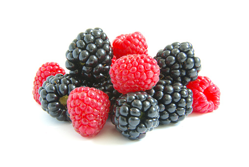 blackberry and raspberry on  white isolated background