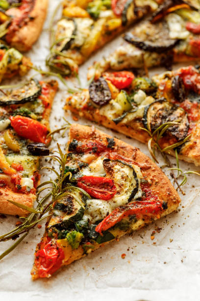 istock Vegetarian pizza with addition grilled vegetables and aromatic herbs 1127544289