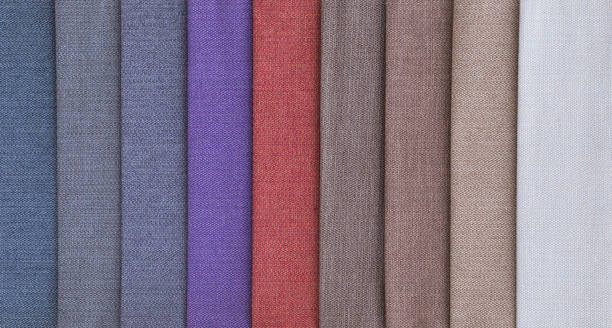 istock Colorful upholstery fabric samples in store 1127544503