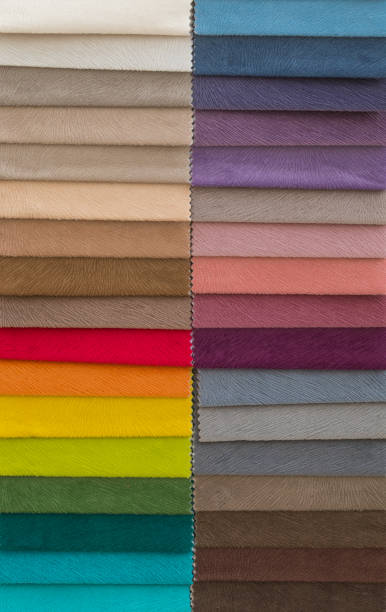 istock Colorful upholstery fabric samples in store 1127544769