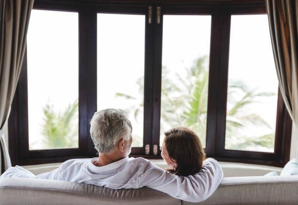 istock A senior couple sitting on a sofa 1127546457