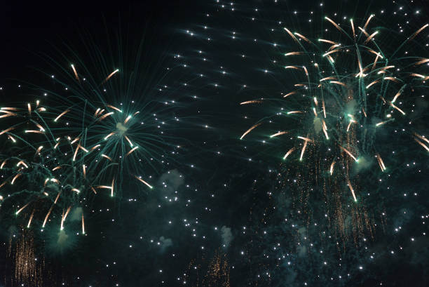istock Fireworks in the night sky on a holiday. 1127546831