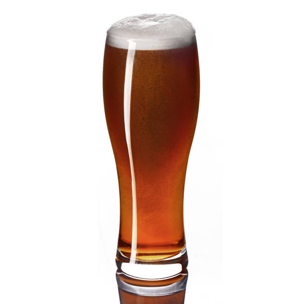 istock Glass of beer isolated on white 1127547363
