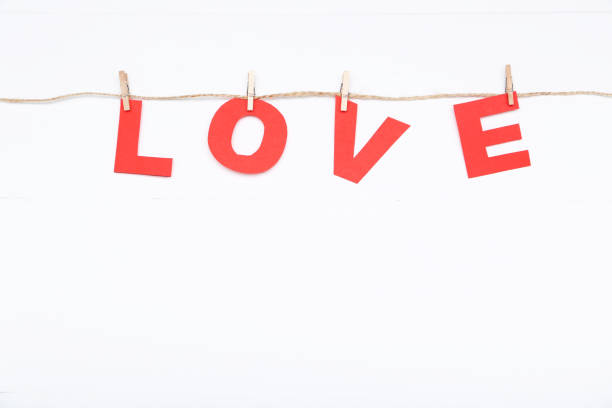 istock Word Love hanging on white background 1127550677