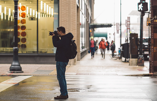 Full Length Of Man Photographing In City