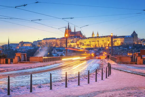 Prague in Winter, the castle and the lighttrails of a tram