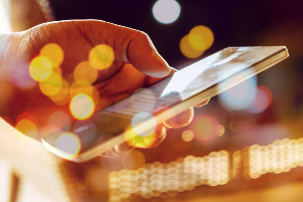 istock Double exposure of Phone on hands. 1127557567