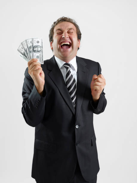 istock businessman with cash 1127558840
