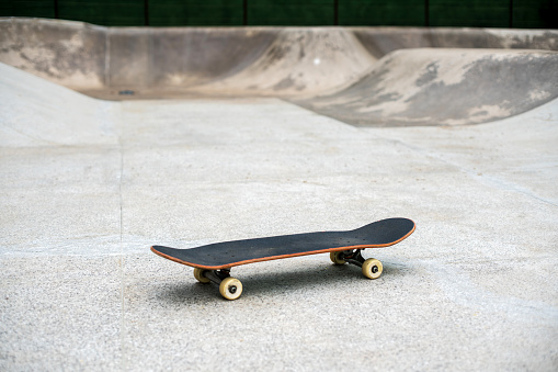 Skateboard ready to ride on a skate park