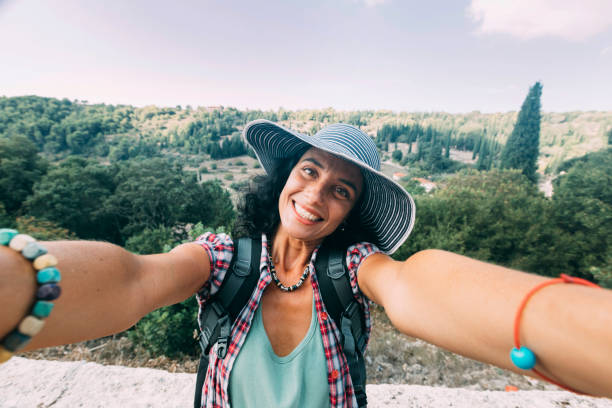 istock Middle age woman making a selfie 1127561098