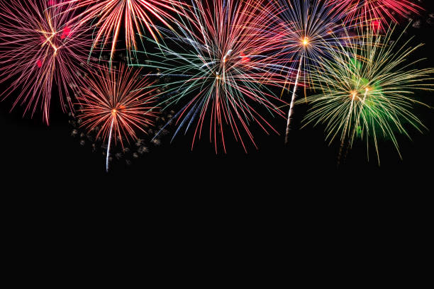 istock Colorful firework on the night sky. New Year celebration fireworks. Abstract firework isolated on black background with free space for text 1127564875