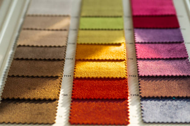 istock Catalog of multicolored cloth from matting fabric texture background, silk fabric texture, textile industry background 1127568264
