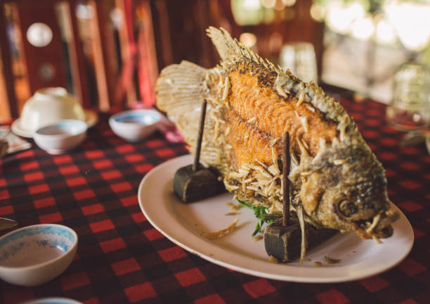 istock Close-Up Of Fish Served In Plate On Table 1127570317