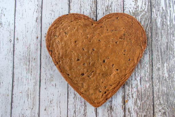 istock Huge Heart-shaped chocolate chip cookie 1127574050