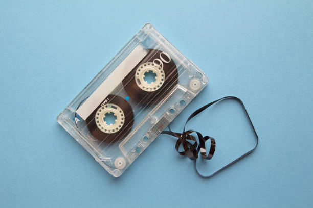 istock Vintage audio cassette tape on blue background 1127577554