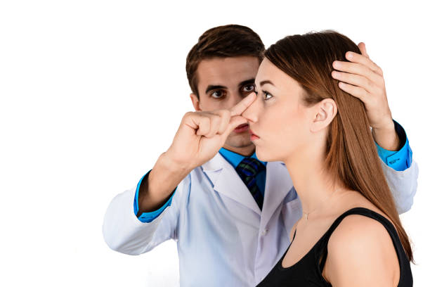 istock Plastic surgery doctor, patient inspection and consultation 1127578238