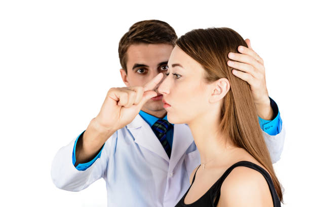 istock Plastic surgery doctor, patient inspection and consultation 1127578299
