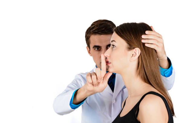 istock Plastic surgery doctor, patient inspection and consultation 1127578394