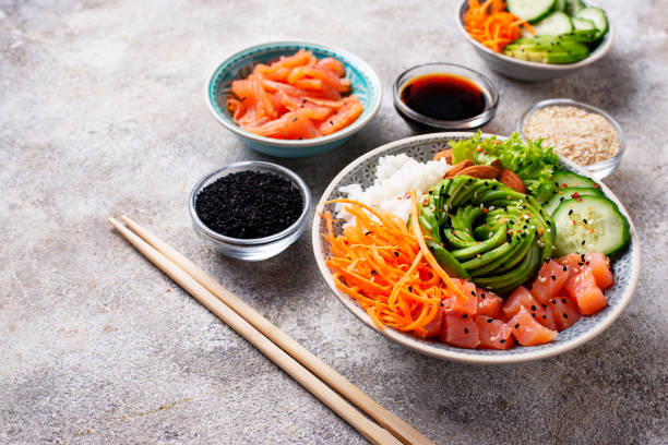 istock Hawaiian poke bowl with salmon, rice and vegetable 1127579365