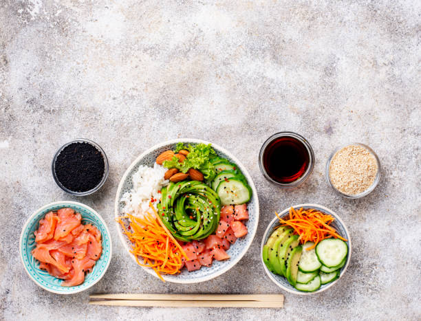 istock Hawaiian poke bowl with salmon, rice and vegetable 1127579385