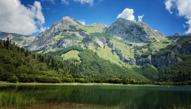 istock Mountain landscape, glacier lake with peaks 1127579844
