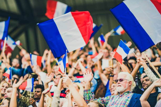 istock French fans with waving flags 1127582232