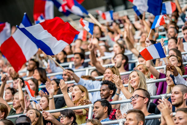 istock French sport fans waving flags 1127582233