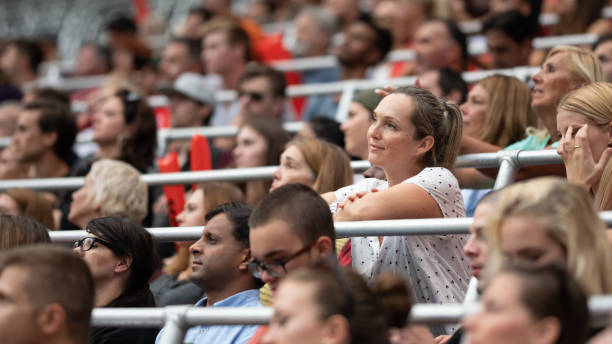 istock People sitting on stadium bleachers 1127582530
