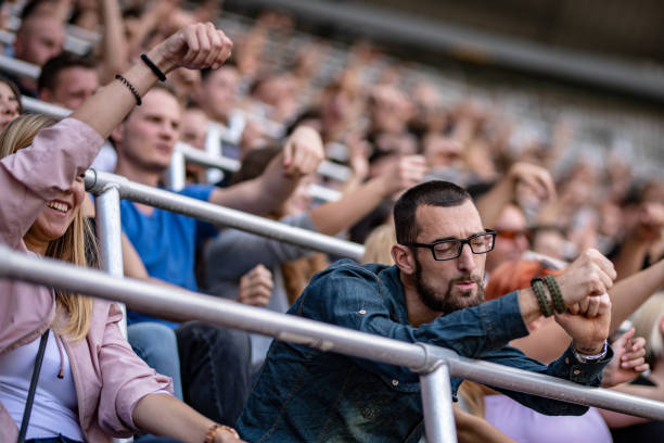 istock Man enjoying himself at a concert 1127582557