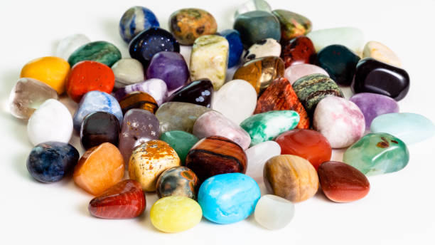 istock handful of various gem stones on white 1127583059