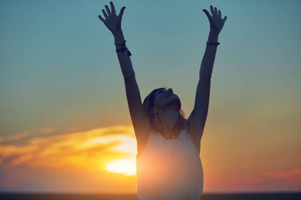 istock Cute young woman jumping in a wheat field. 1127583928
