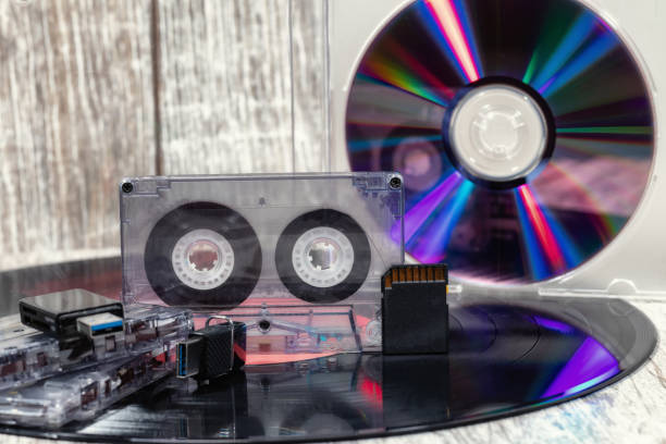 istock vinyl record, laser disc and USB flash drive 1127584354