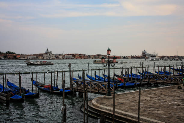 Gondolas moored Venice (Italy) Gondolas moored paisaje urbano stock pictures, royalty-free photos & images