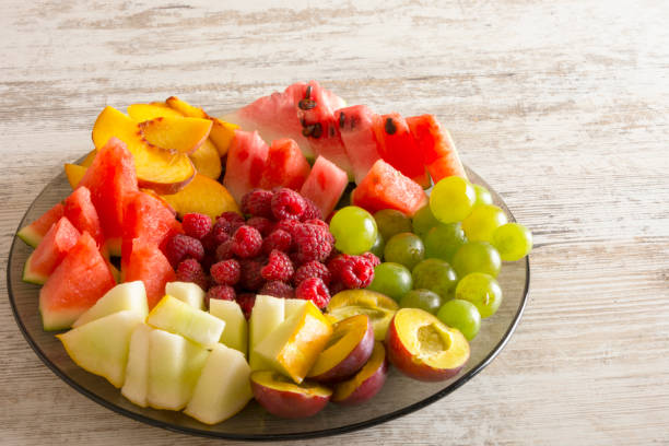 istock Fruit mix. Peach, grapes, apple, watermelon, melon, raspberry, plum. 1127585959
