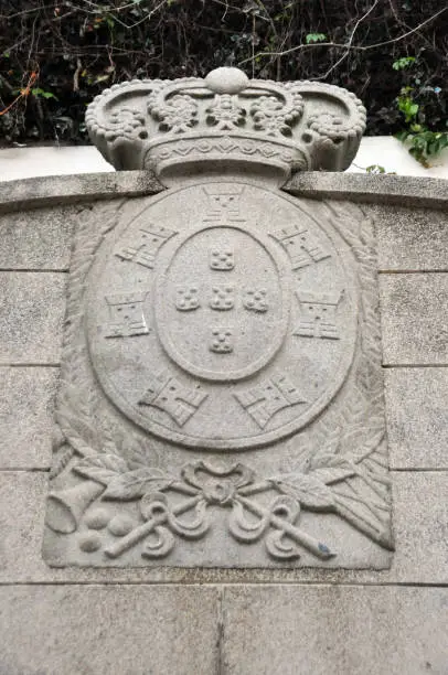 Photo of Leal Senado Building - fountain in the garden - Portuguese coat of arms - Unesco World Heritage Site, Macau, China