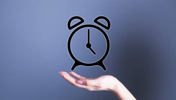 istock businesswoman alarm clock 1127586747