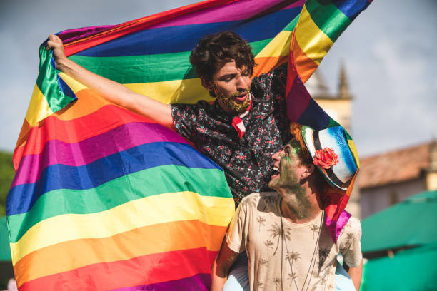 istock Homosexual couple flag with rainbow flag 1127589538