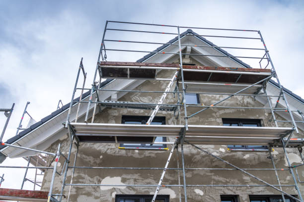 istock New build house and scaffoling worked on plastering 1127590157