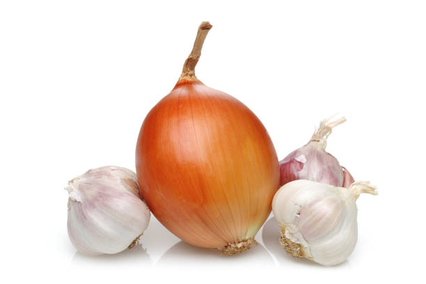 istock Onion and garlic on white background 1127591301