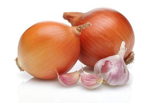 Onion and garlic isolated on white background